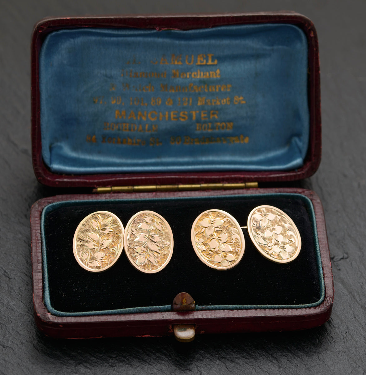 Antique cufflinks with store hallmark